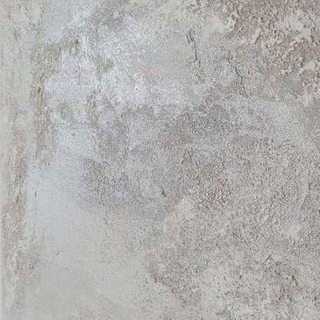 Oberfläche in grauer Struktur und unregelmäßiger Textur.